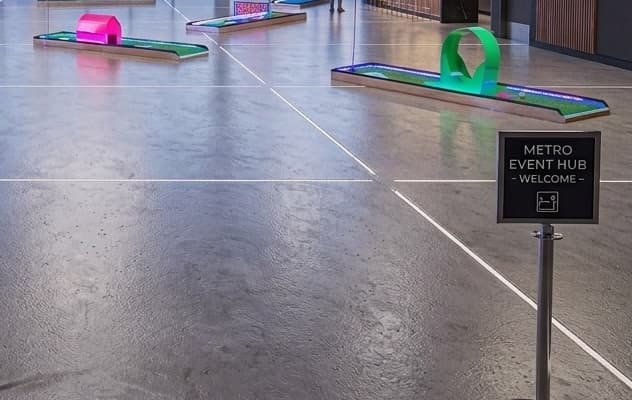 Indoor mini golf event setup