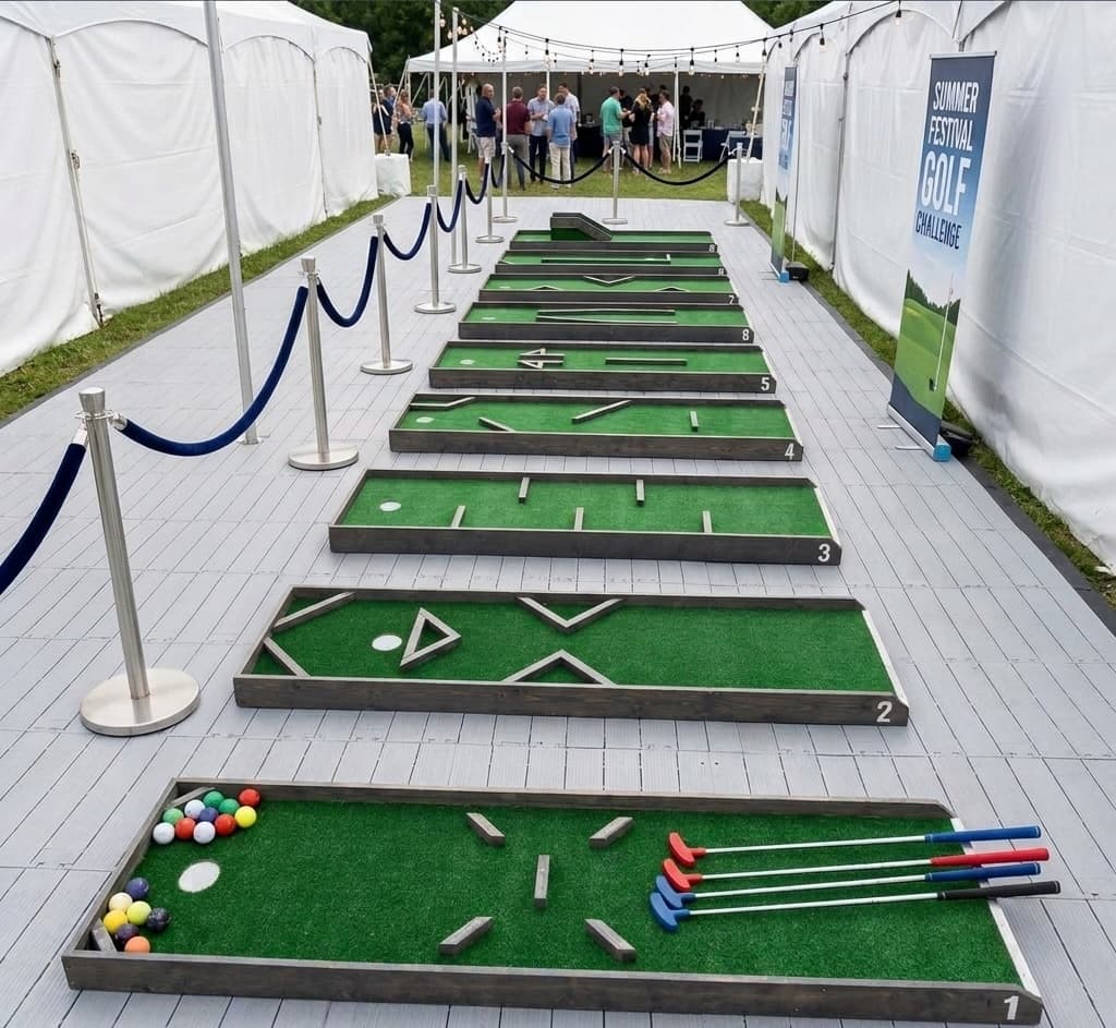 Mini golf course at tented corporate event